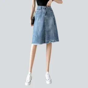 Asymmetric curve embroidered denim skirt